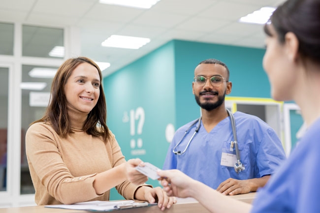 Featured news image - woman in conversation with a doctor